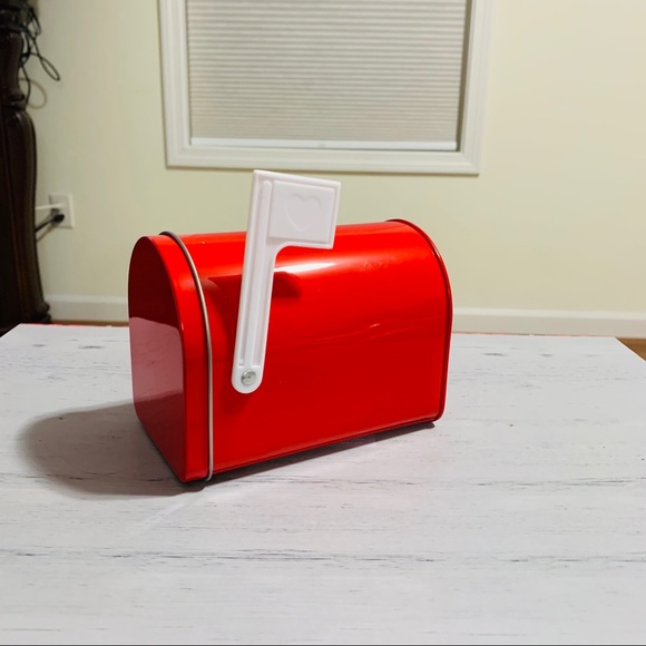 Tin mailbox with white flag